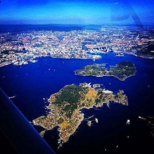 Flying over Oslo in Norway, take off from Kjeller